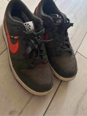 Nike Olive Green Low-Top Sneakers with Orange Swoosh